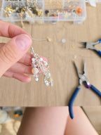 Baltu un sudraba toņu gaisīgie auskari