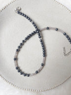 Latvieša pelēkās krelles no hematīta un nefrīta